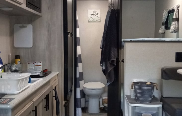 There is a full-functioning toilet and shower for your convenience