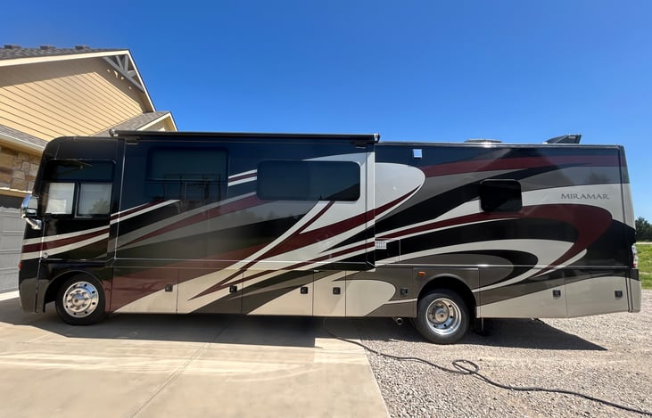 Driver side
1st slide, outdoor shower, utility hook ups and generator