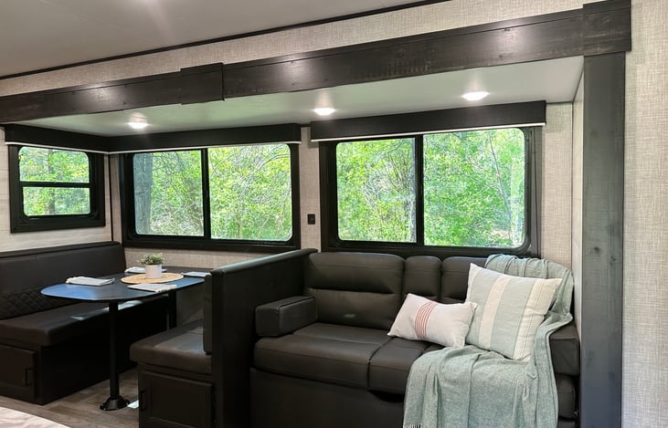 Dinette and couch with nice large windows!
