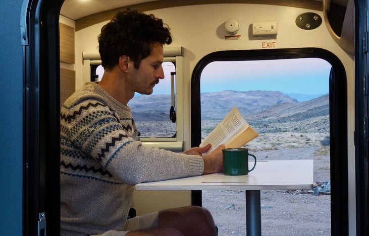 Sweet pop up table & bed -> couch conversion. Work remotely, anyone?