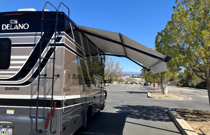 Rv from rear with awing out .