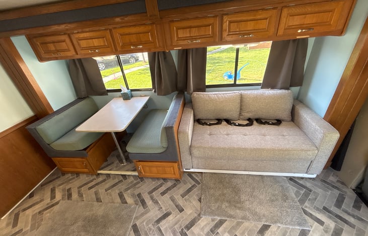 Dinette and pullout sofa bed. 
This sofa is brand new. It converts into a bed so easily my seven year-old does it with one hand. It is a full bed that is much more comfortable than the old sofa folder