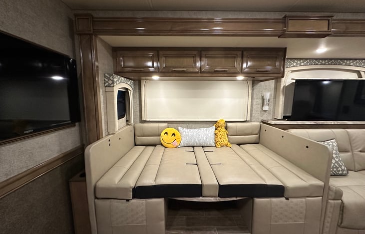 Dinette table option to a Bed,
2 TV on living area