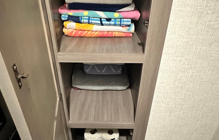 Bunk house half bath linen closet