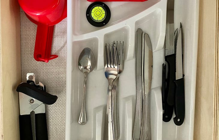 Silverware, measuring cups a and spoons, can opener