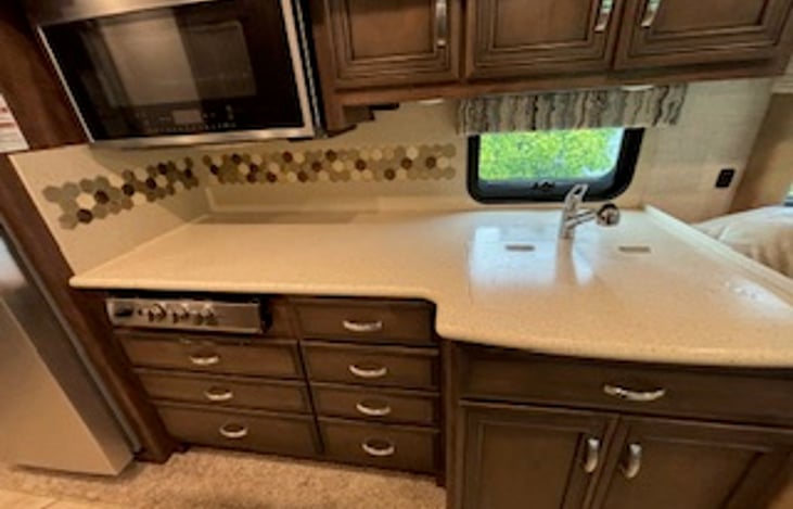 Good counter space for the Keurig Coffee Maker, Air Fryer, Toaster or Cosori Tea Kettle which are all included & onboard.