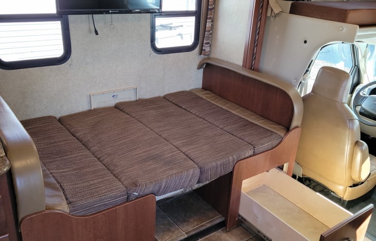 Dinette folds down for more sleeping.