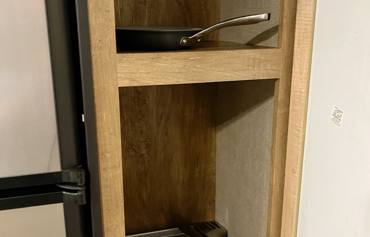 Cookware and coffee maker included for use.