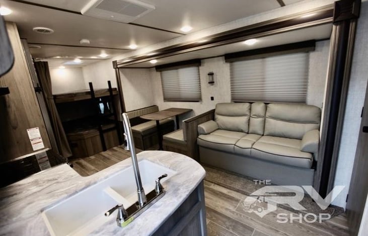 Couch and dinette fold out into sleepers