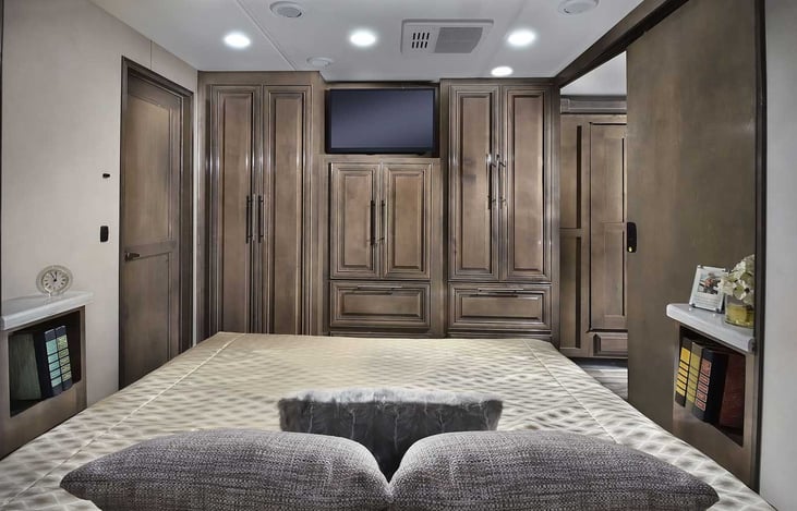 TV in Primary bedroom, and storage view.