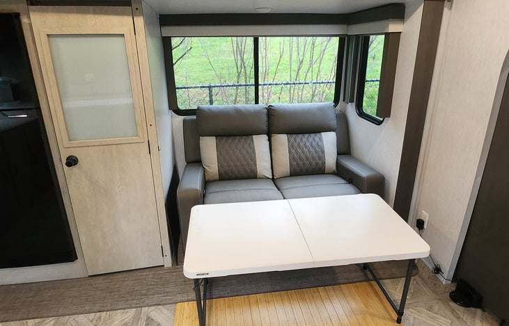 FOLDING TABLE FOR USE WITH SOFA.