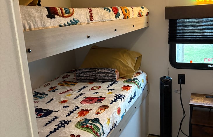 All upgraded mattress mattresses. Linens washed in laundry sanitizer. Plenty of storage and family games under the bunk.