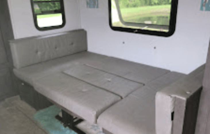 Dinning Table converts to a full size bed.