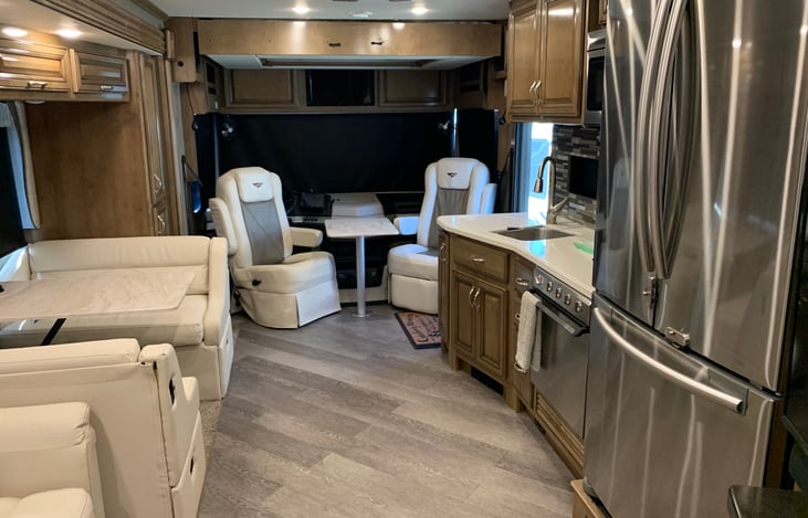 Driver & passenger seats swivel & table installed.