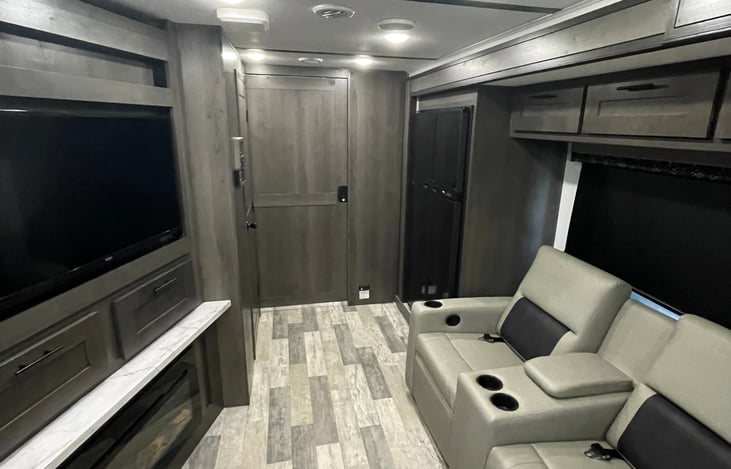 Theater Seating, Closed Door to Bedroom