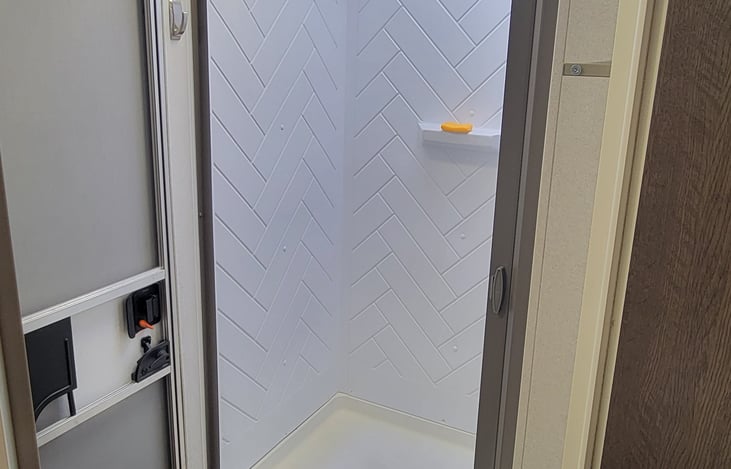 24 x 36 shower with retractable door.