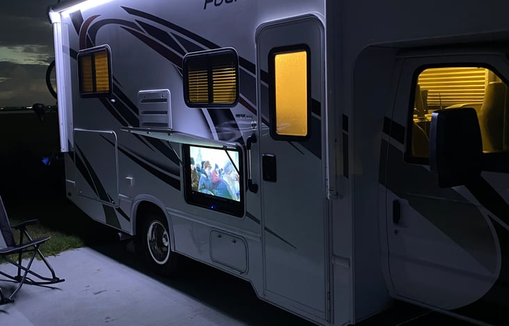 Outside TV with streaming capability and sound bar.