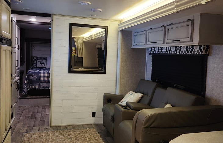 84" ceiling height + storage space above theater-seating