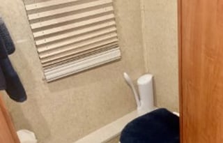 A 5th wheel travel trailer suited for 2 people