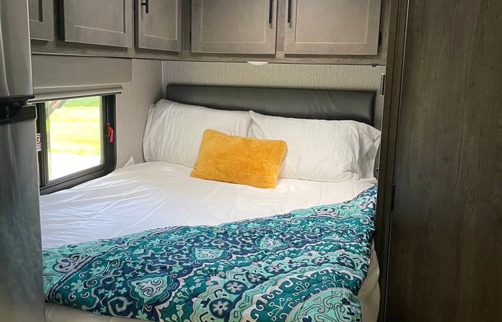 Master Bed, ample storage above, and below.