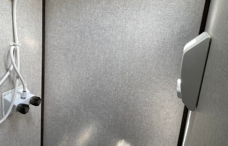 Shower with Soap/Shampoo/Conditioner dispenser.