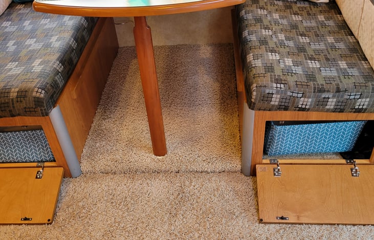 Vacuum storage bin with lots of additional storage. Also comfortable view area to watch TV or movies