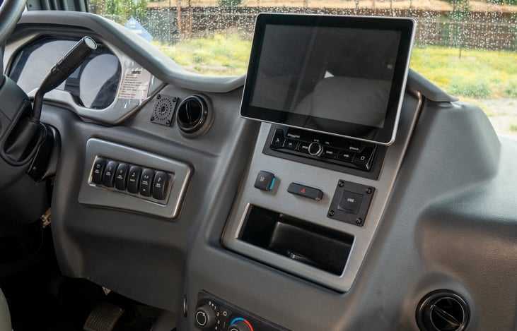 dash technology gives the driver everything they need within reach including backup and side view cameras, switch controls, climate controls, fan and shade controls, blue tooth audio and more.