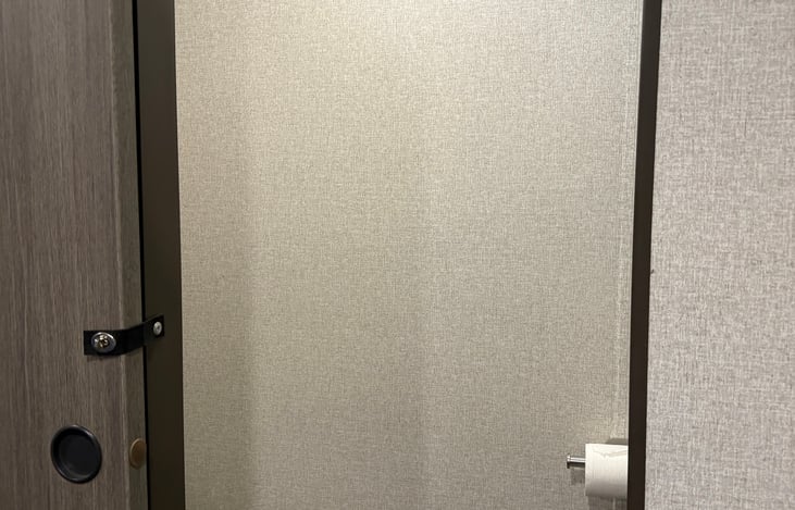 Master suite has a half bath. Toilet and sink with a medicine cabinet.