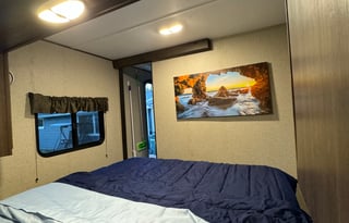 Cozy, lightweight 9 person travel trailer