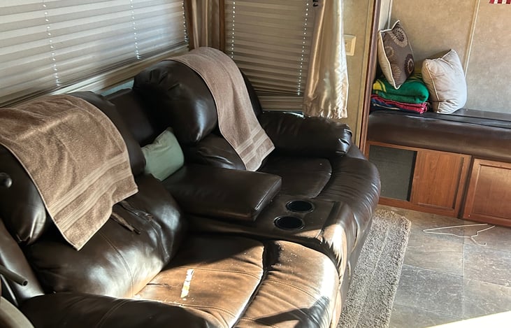 Both chairs recline.