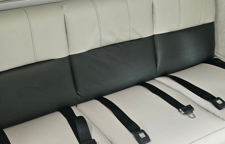 Convertible bench sheet with three sets of seat belts.