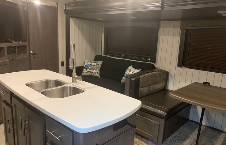 Couch and dinette fold out for additional sleeping space. ( linens NOT provided for these beds )