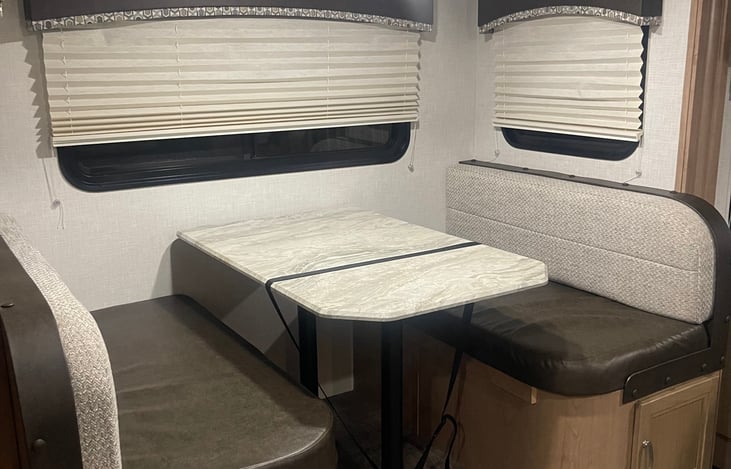 Dining area which transforms into a sleeping area.