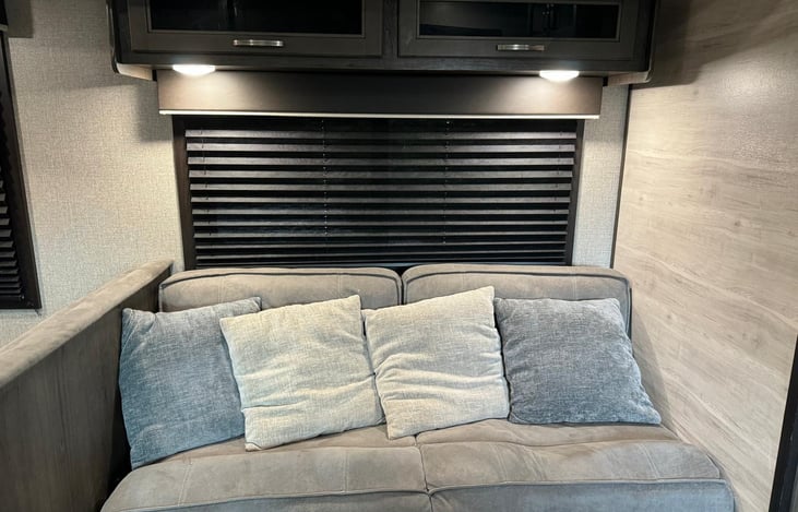 This a Sofa/ bed either 1 or 2 person can sleep on it.