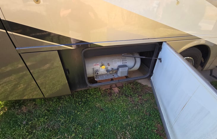 22.7 gallon propane tank. Additional propane also available for additional cost with gas grill and outdoor burners for outdoor kitchen