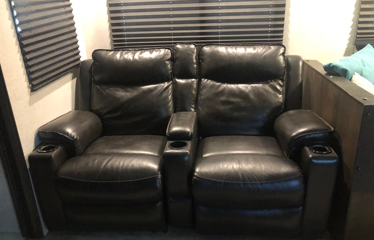 Heated option, LED lit, vibrating  leather recliners with 3 cup holders.