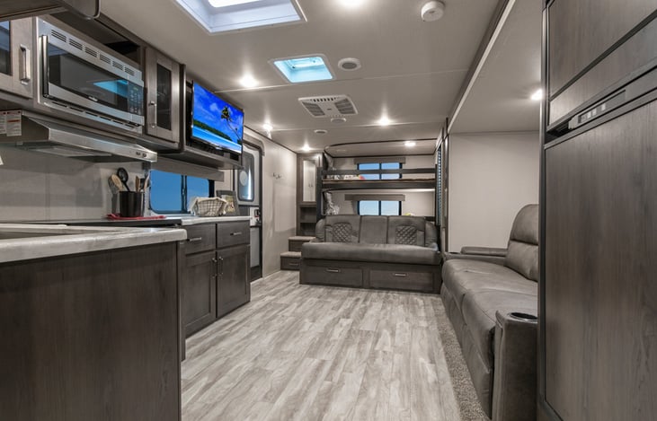 Living area and Kitchen, bunk beds and Jack-knife couch