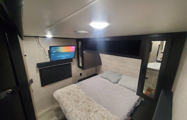 Master bedroom- Queen size bed with TV