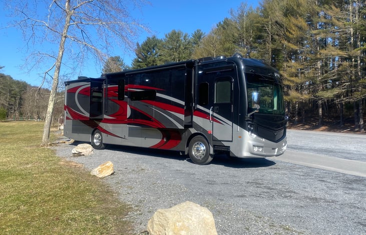 Passenger side, slides out.