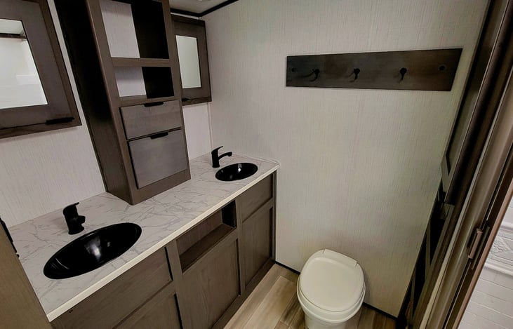 Double sinks and large walk-in shower.