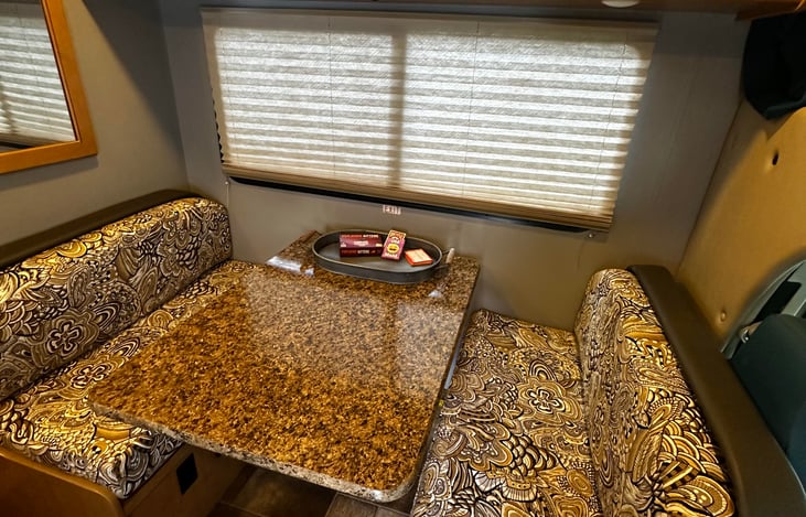 Dinette converts into a bed.