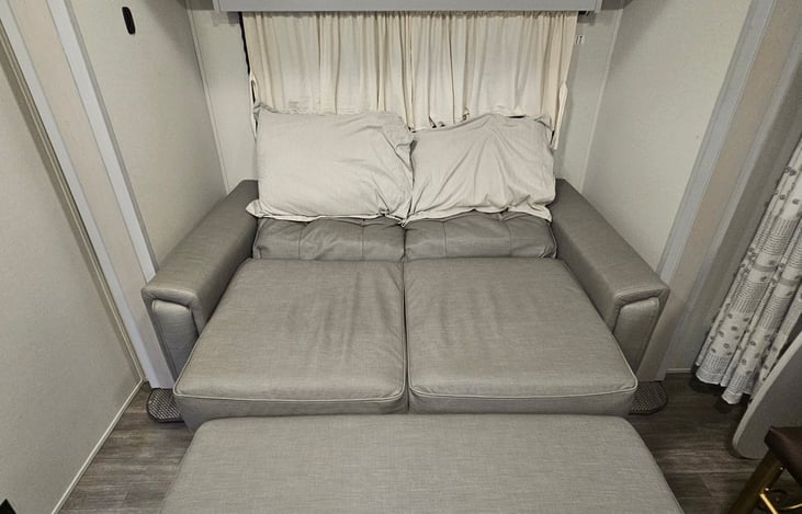 Loveseat fully converts into a second bed — perfect for kiddos or cozy sleepers.