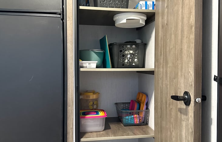 Pantry area that doubles as a hanging closet area if shelves are removed.Please ask if needed.