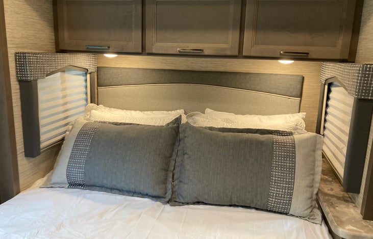 Storage bins over queen bed