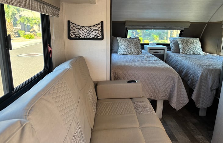 Queen bed converted to 2 twin beds w/ 10" memory foam mattresses - plenty of storage underneath beds