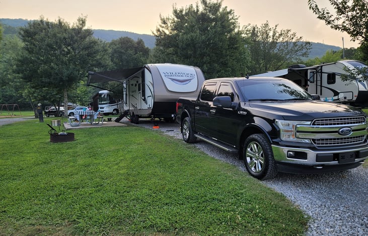 Half Ton, with tow package, towable.