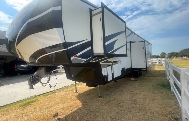 The camper has a total of four slides - one on the left side and 3 on the right side.