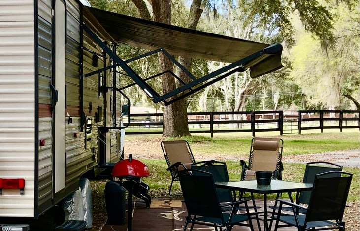 Electric outdoor barbecue grill, dining table and chairs and zero gravity chairs for your comfort!