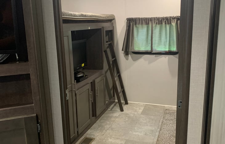 Rear bunkhouse room. Has door to separate it from main living space.