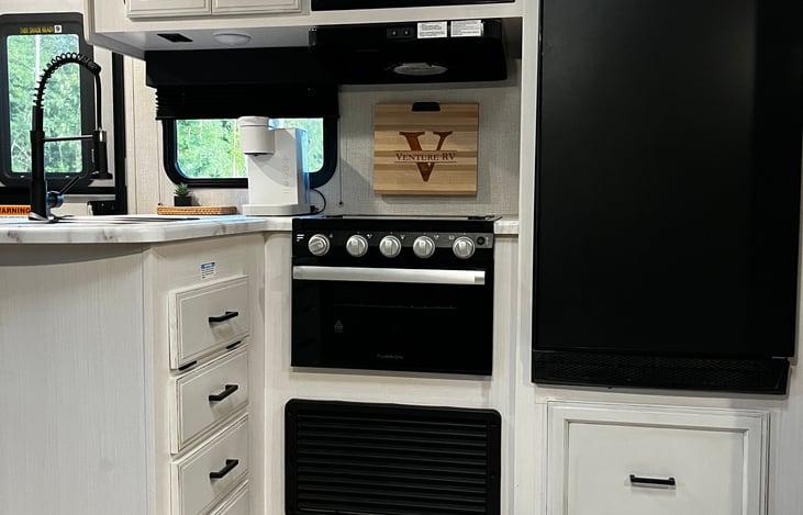 Fridge and freezer are a nice size, stove, oven and microwave